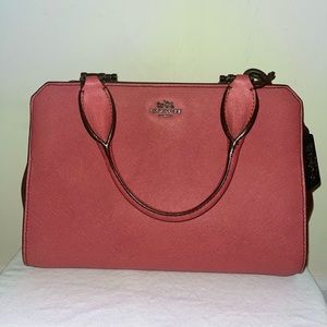 Medium sized pink coach purse